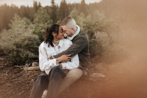 Adventurous engagement session at sunrise on a mountaintop in Lake Tahoe