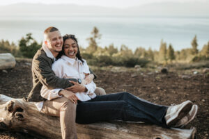 Adventurous couple hikes to a mountaintop for their Lake Tahoe engagement photos