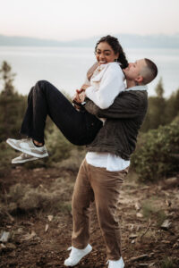 Adventurous couple hikes to a mountaintop for their Lake Tahoe engagement photos