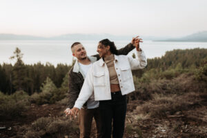 Lake Tahoe engagement session with golden sunrise light and panoramic mountain views